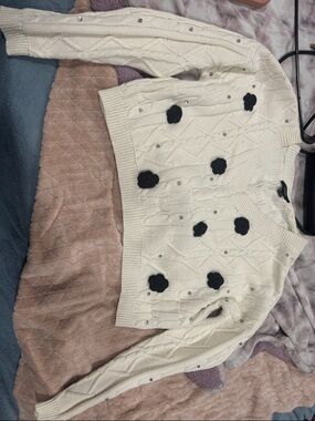 Women’s Cream Cable Knit Sweater with Black Flower Appliqués
